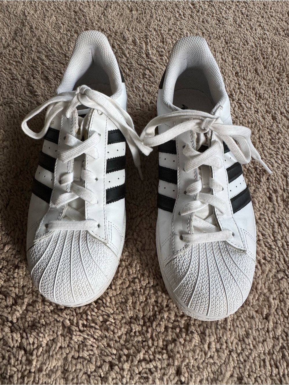 adidas Superstar White Sneaker with Black Stripe Detail